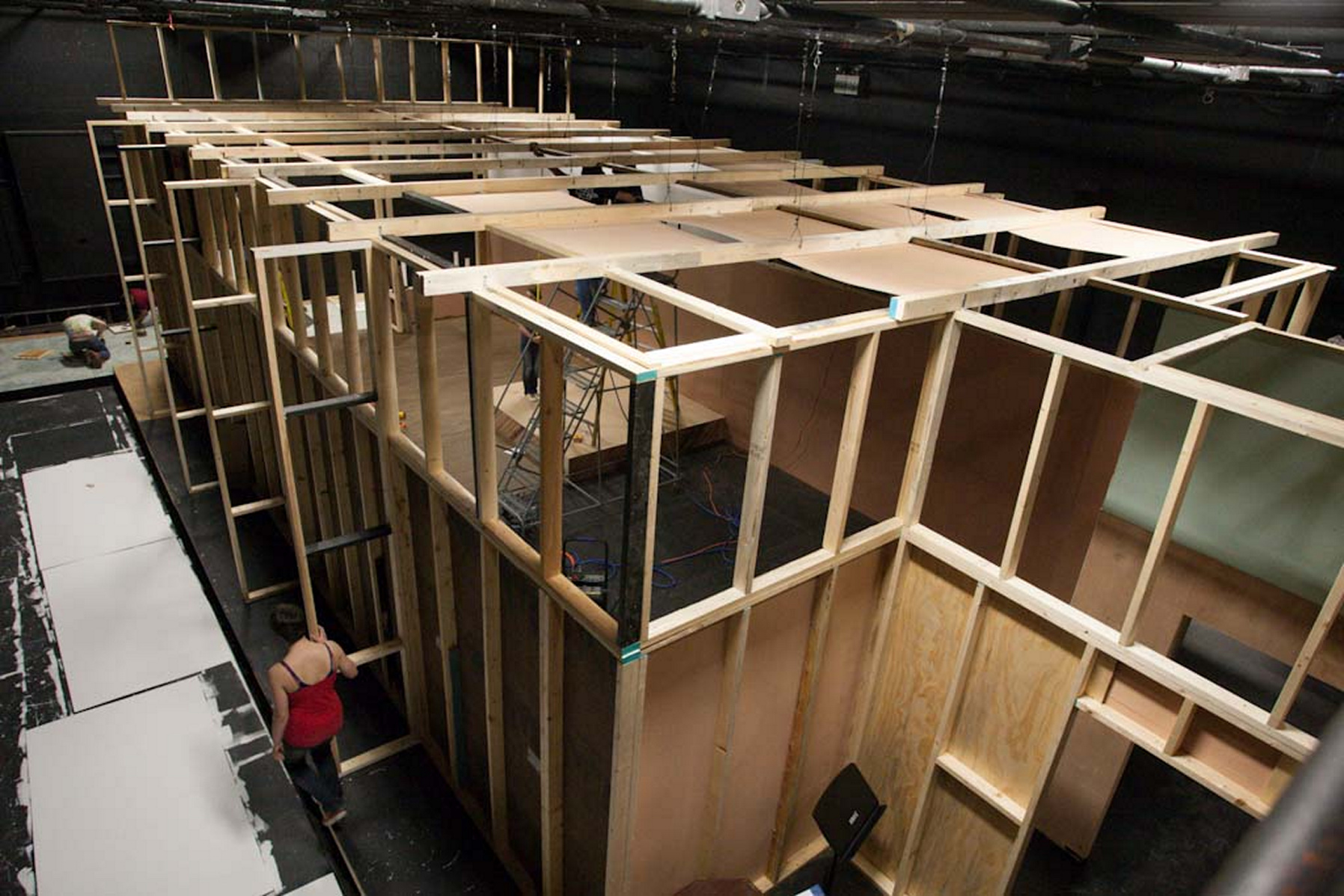 Students construct the set in studio theatre