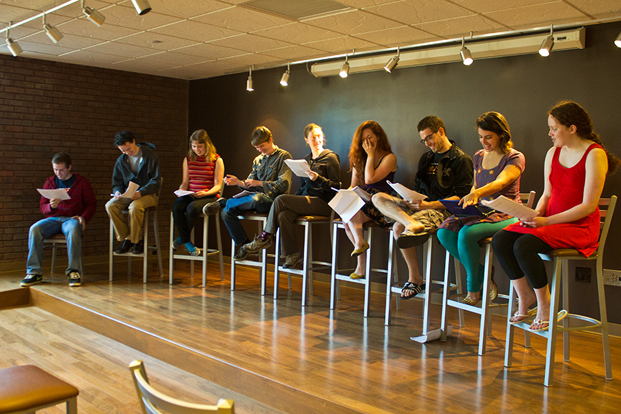 students in a table reading