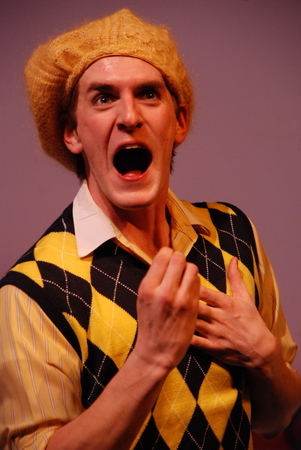 a close-up of a man addressing the audience